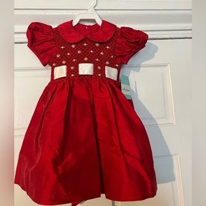 Anavini smocked red dress. New with tags! Perfect for the Holidays! Size 2.